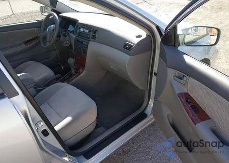 2005 Toyota Corolla Le z USA, uszkodzony, nr VIN 2T1BR30E55C463339